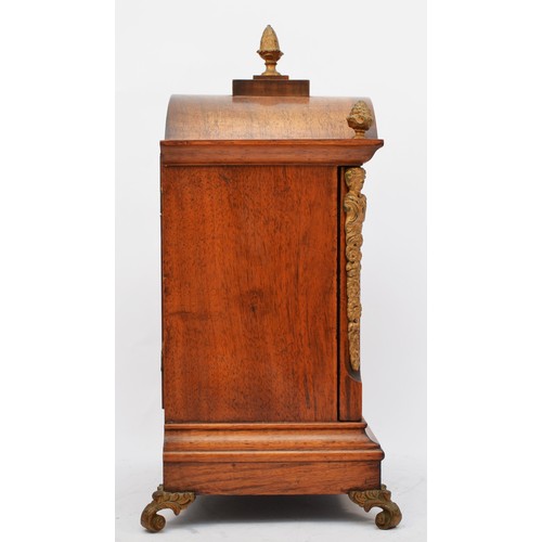 284 - Winterhalder & Hofmeier, a late 19th century walnut arched mantel clock, gilt dial with silvered cha... 