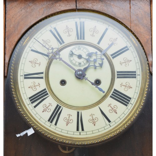 300 - A 19th century Viennese double weight wall clock, the celluloid dial with Roman numerals, the unsign... 