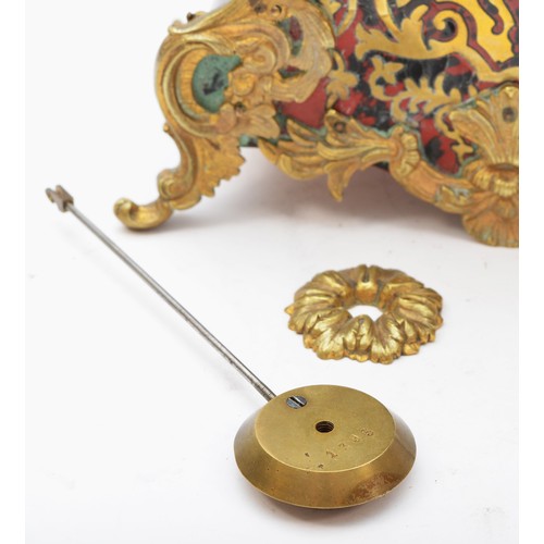 289 - A 19th century French boulle mantel clock, the gilt dial with white enamel numerals, the shaped case... 