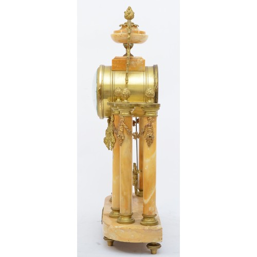 281 - J. Bernard, Montlucon, a 19th century French cream variegated marble and ormolu clock garniture, the... 