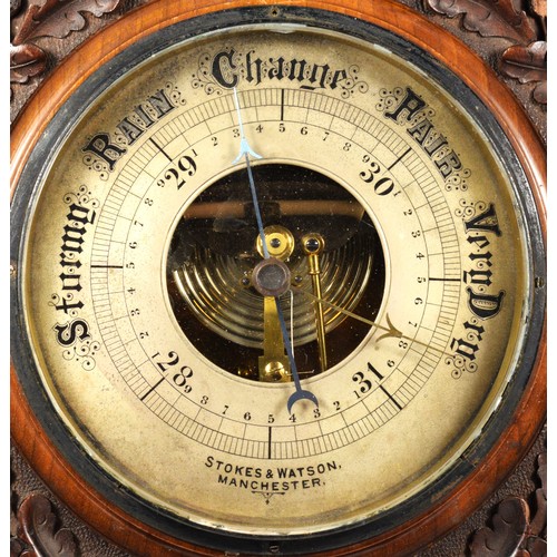 309 - Stokes & Watson, Manchester, Victorian oak aneroid barometer, the signed 7 inch silvered dial within... 