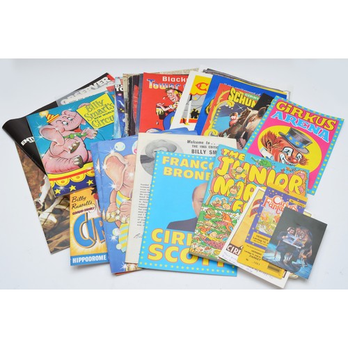 401 - A collection of circus and magic related literature, including programmes, ticket stubs, hardback bo... 