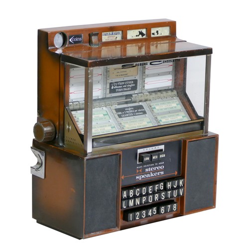 412 - A Seeburg Consolette wall mounted jukebox, model SCH 3-4, with stereo speakers, three volume keys an... 