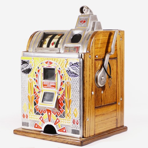 An O.D. Jennings Silent Peacock slot machine, one arm bandit, c