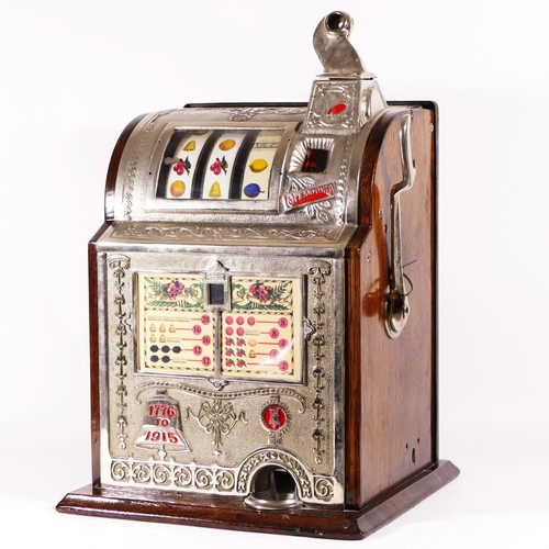 421 - A Mills Operators Bell Spearmint slot machine, one arm bandit, c.1915, restored and working on an Am... 