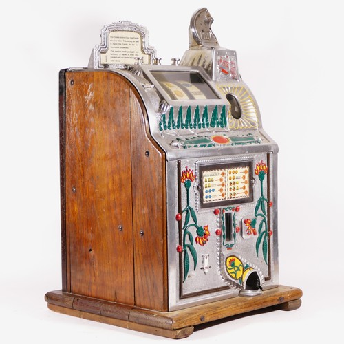 423 - A Mills Poinsettia Revamp slot machine, one arm bandit, c.1932, vertical stack jackpot, restored and... 