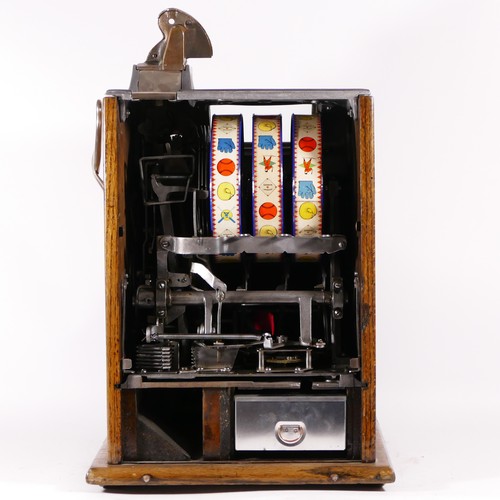 424 - A Mills baseball slot machine, one arm bandit, c.1929, vendor front, restored and working on an Amer... 