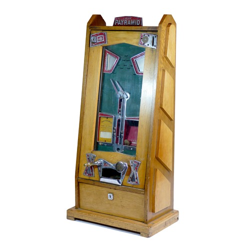 457 - A Bryans Payramid oak skill travelling arcade ball catching game, penny slot machine, designed c.193... 