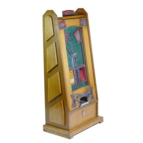 457 - A Bryans Payramid oak skill travelling arcade ball catching game, penny slot machine, designed c.193... 