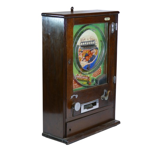 452 - An Allwin De Luxe penny slot machine, c.1920's, branded with Rowntree's fruit gums, mahogany cabinet... 