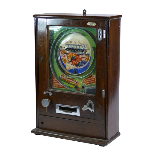 452 - An Allwin De Luxe penny slot machine, c.1920's, branded with Rowntree's fruit gums, mahogany cabinet... 