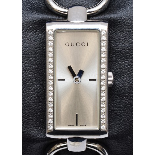 135 - A Gucci, Tornabuoni, stainless steel and brilliant cut diamond set quartz ladies wristwatch, ref 119... 