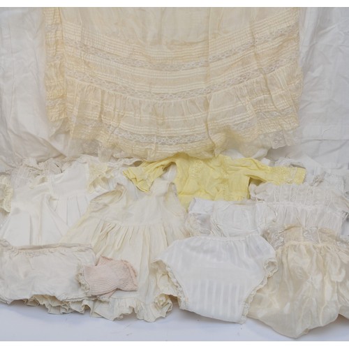 205A - A selection of babies christening clothing to include eight christening gowns of different styles an... 