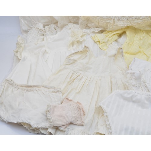 205A - A selection of babies christening clothing to include eight christening gowns of different styles an... 