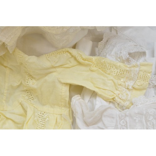 205A - A selection of babies christening clothing to include eight christening gowns of different styles an... 