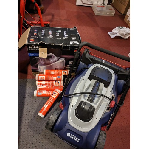 25 - A Spear & Jackson lawnmower, together with a Braun CareStyle 3 steam iron and assorted tubes of Tota... 