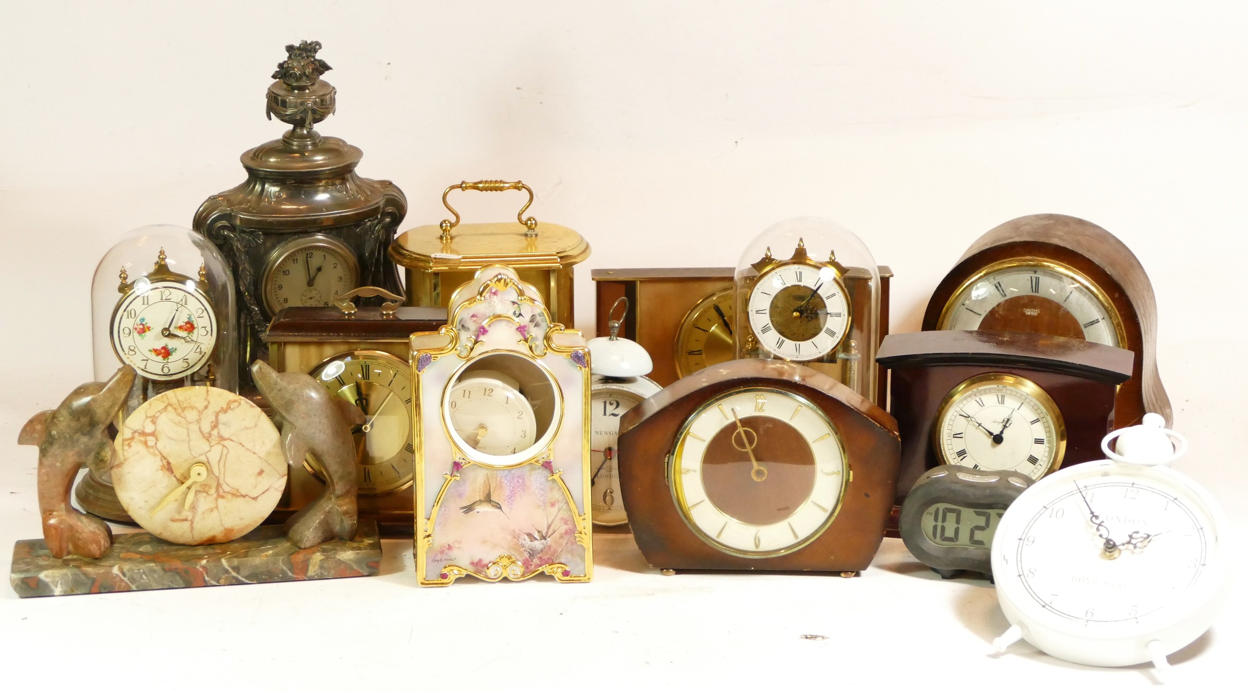 A collection of mechanical and quartz clocks, to include mantel clocks ...