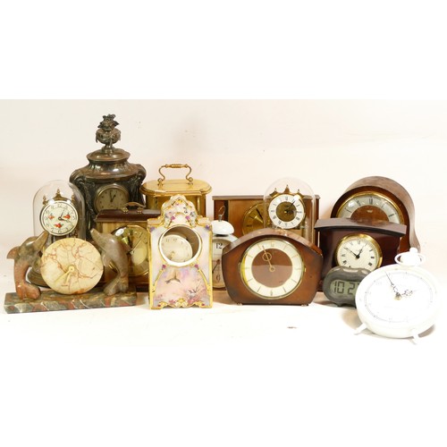 A collection of mechanical and quartz clocks, to include mantel clocks ...