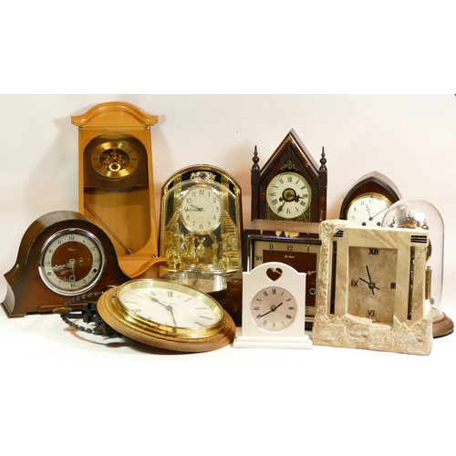 A collection of quartz and mechanical clocks, to include wall clocks