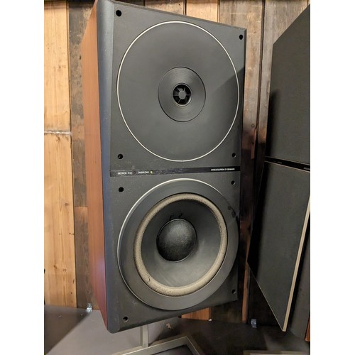 31 - A pair of Bang & Olufsen Beovox S50 speakers with stands, 26 x 78 x 26cm