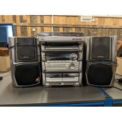 36 - An Aiwa Z-L30 digital audio system, with dual tape decks, 5 cd changer and tuner with matching speak... 