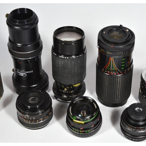 56 - Thirteen manual lenses to include a Cosina 35mm-70mm f3.5-f4.8, a Promura 35mm f3.5, a Hanimex 28mm ... 