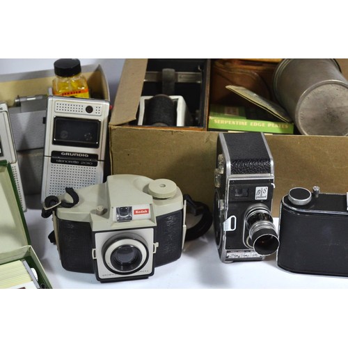 59 - A collection of film, digital and video cameras, to include an Olympus C-740 ultra zoom, with 2gb XD... 