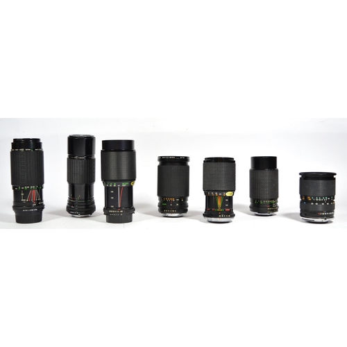 Seven manual camera lenses, to include a Japanese made 80mm-200mm f4.5 ...