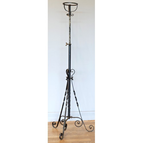 A Victorian wrought iron oil lamp stand, with adjustable column, 117