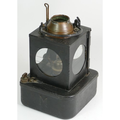 27 - An L.N.E.R. signal lamp with metal sign 