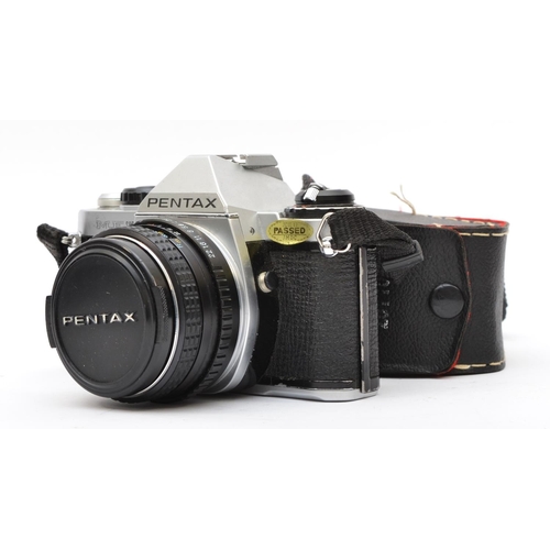 120 - A Pentax ME Super 35mm film camera, with a SMC Pentax 50mm f1.7 lens, cased, working, faint hazing i... 