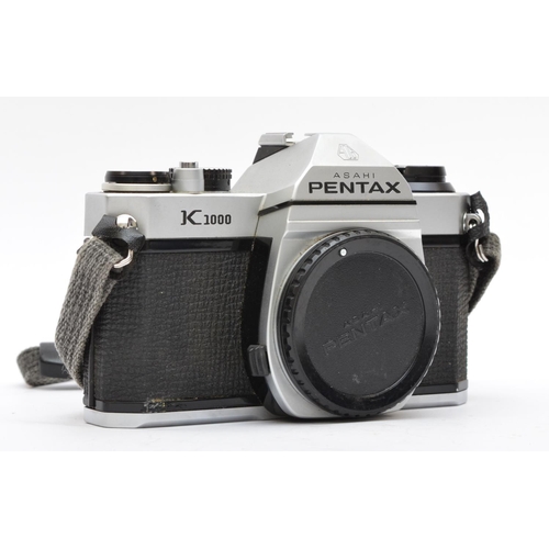 124 - A Asahi Pentax K1000 35mm film camera, body only, working