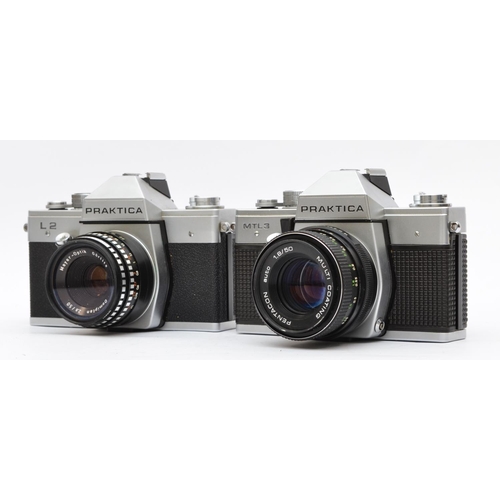 131 - A Praktica L2 35mm film camera, with a Meyer Optik 50mm f2.8 lens, cased, together with a Praktica M... 