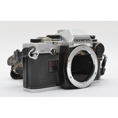 140 - A Olympus OM-10 35mm film camera, body only, working