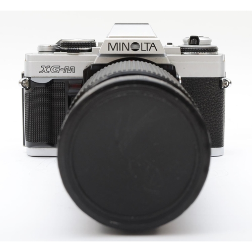 178 - A Minolta XG-M 35mm film camera, with a Vivitar 70mm-210mm f3.5 lens