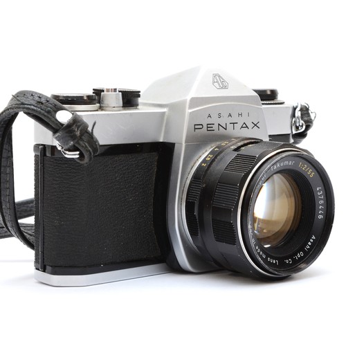 197 - A Asahi Pentax 35mm film camera, with a Super-Takumar 55mm f2 lens, with manual, together with three... 