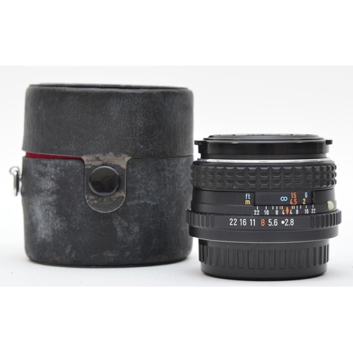 201 - A Asahi Pentax SMC 35mm f2.8 lens, in original case, working with a faint haze and dust specks in th... 