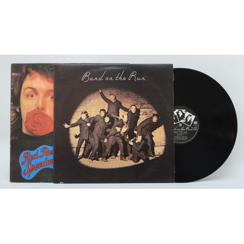 216 - Beatles related vinyl, to include two LPs, Wings - Band On The Run (PAS10007) with poster and Wings ... 