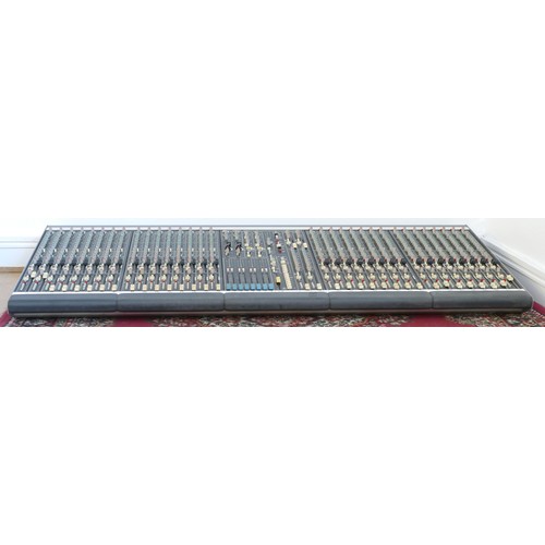 244 - A Allen & Heath GS3000 32 channel mixing desk, together with patchbays and wiring looms