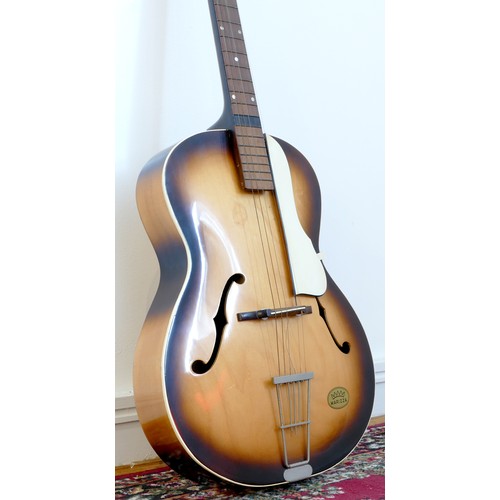 267 - A Marizza acoustic guitar, sunburst colourway with white scratch guard, twin f-holes, 46cm neck