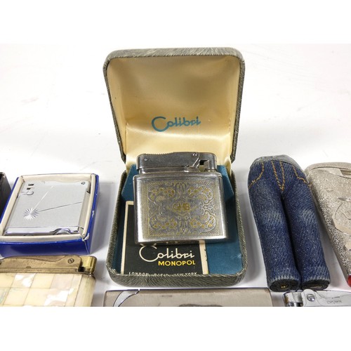 326 - A collection of pocket cigarette lighters, petrol and gas examples, makers to include - Colibri, Win... 