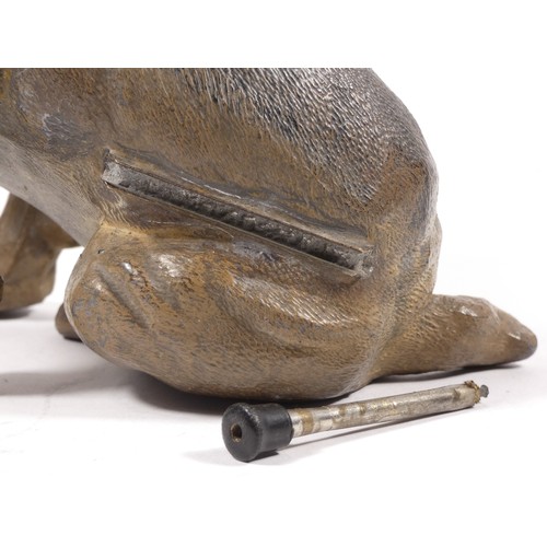 332 - A mid 20th century figural 'Striker' table cigarette lighter, in the form of a seated Bulldog, cold ... 