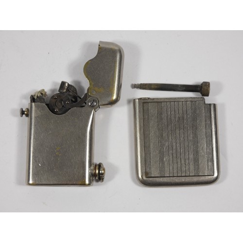 334 - A 1920s Thorens semi automatic gents pocket cigarette lighter, nickel plated brass, petrol operated,... 