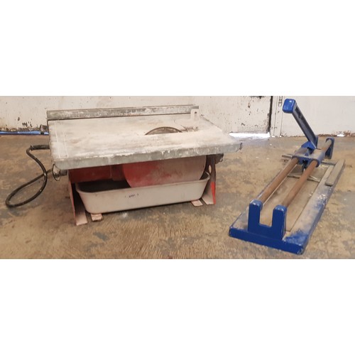 6 - A Ferm TZ-700 electric 240v tile cutter, together with a manual example. (2),