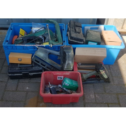 18 - A selection of power tools and hand tools, to include two nail guns with a large quantity of associa... 