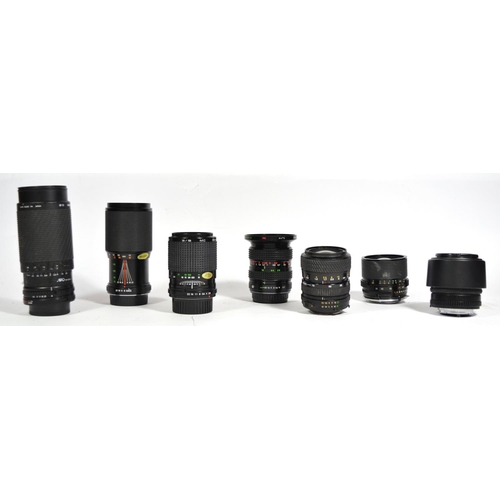 47 - Seven manual camera lenses, to include a Sigma 28mm-70mm f3.5-f4.5, a Sigma 75mm-300mm f4.5-f5.6, a ... 