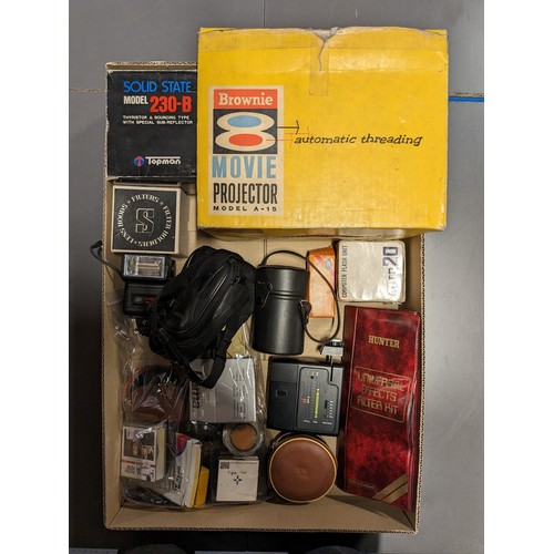 49 - A substantial collection of camera and photography accessories, to include flash units, camera cases... 
