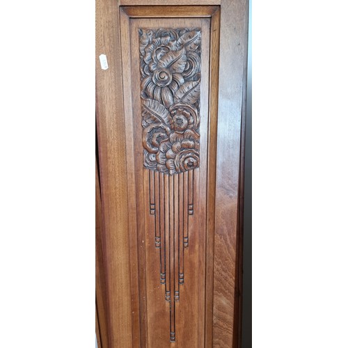 59 - A French Arts & Crafts inspired Edwardian walnut double wardrobe, together with an Edwardian double ... 
