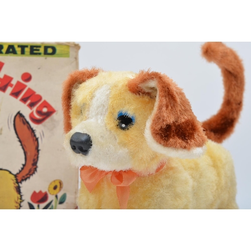 358 - A battery operated Somersaulting Pup, with bark, original box