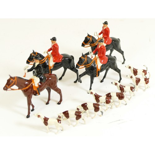 372 - Britain's hand painted lead figures, Hunting, with four riders on horseback and eight hounds